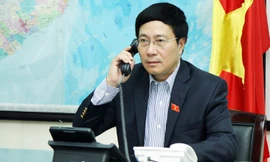 Phó Thủ tướng, Bộ trưởng Bộ Ngoại giao Phạm Bình Minh điện đàm với Ngoại trưởng Mỹ John Kerry. Ảnh: Vụ Thông tin báo chí