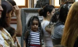 Những người Kito giáo tham dự 1 buổi lễ hôm 31/8 tại nhà thờ Saint- Joseph ở Erbil. Ảnh: AFP.