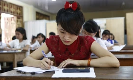 Thí sinh thi cao đẳng làm bài chiều 15/7. Ảnh: Như Ý