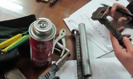 Tang vật thu được trên người tên cướp xe SH