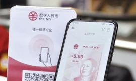 Đồng nhân dân tệ kỹ thuật số được đánh giá là một trong những sáng kiến tiên tiến nhất thế giới. Ảnh: Kyodo 