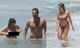 Sao truyền hình Úc hớ hênh vòng một ngoại cỡ với áo tắm buộc dây