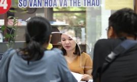 Công chức, viên chức làm việc tại Trung tâm hành chính TP Đà Nẵng. Ảnh: Nguyễn Thành