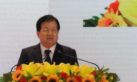 Phó thủ tướng Trịnh Đình Dũng phát biểu tại buổi lễ công bố các Nghị định, Quyết định của Chính phủ và Thủ tướng Chính phủ về phát triển TP Đà Nẵng. 