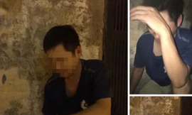 Người đàn ông bị người dân giữ lại khi xảy ra vụ việc.