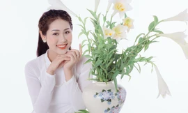 Thiếu nữ Hà Thành khoe vẻ đẹp dịu dàng bên hoa loa kèn