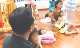 Hiện nay, tất cả người nhiễm HIV đều được hỗ trợ mua thẻ BHYT, trong đó có trẻ em từ 6 đến 16 tuổi. Ảnh minh họa