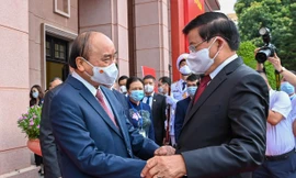 Chủ tịch nước Nguyễn Xuân Phúc đón tiếp Tổng Bí thư, Chủ tịch nước Lào Thongloun Sisoulith. (Ảnh: Như Ý)