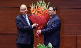 Chủ tịch nước Nguyễn Xuân Phúc và Thủ tướng Phạm Minh Chính