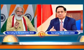 Thủ tướng Phạm Minh Chính (phải) và Thủ tướng Ấn Độ Narendra Modi. (Ảnh: Mofa)