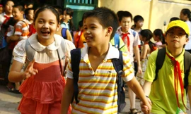 Làm sao để mỗi ngày đến trường là một ngày vui? Ảnh: Hồng Vĩnh.