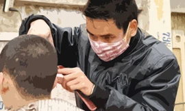 Anh thợ cắt tóc