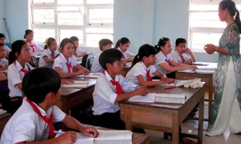 Một giờ lên lớp trong phòng học mới tại trường THCS Phan Châu Trinh. Ảnh: Nguyễn Trang