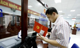 Người dân, doanh nghiệp sẽ tiết kiệm được thời gian và công sức khi giao dịch điện tử trong lĩnh vực đất đai được thực hiện. Ảnh minh họa: Như Ý