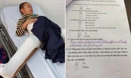 Cháu Kiên những ngày điều trị tại bệnh viện cùng với phiếu khảo sát của nhà trường về sự việc (ảnh: Mỹ Hà)