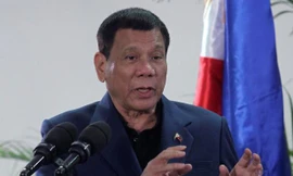 Tổng thống Philippines Rodrigo Duterte trong cuộc họp báo vào rạng sáng ngày 22/10.