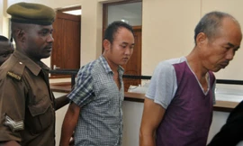 Hai bị cáo Xu Fujie và Huang Qin