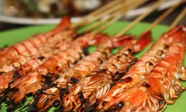 Ăn tôm, cua, ốc nướng có thể ho ra máu