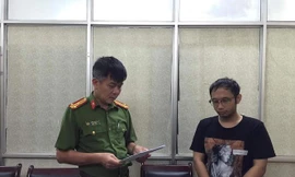 Ông Lê Thái Sơn khi bị tạm giữ.