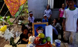 Di ảnh em Phạm Thị Nhung.