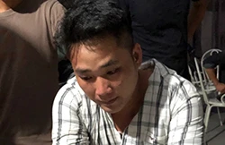 Nguyễn Văn Thuận khi bị bắt giữ. Ảnh: Thế Phong