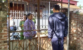 Đinh Thị Then tại buổi thực nghiệm hiện trường về hành vi sát hại tình nhân.