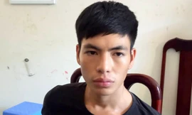 Nguyễn Văn Tuấn tại cơ quan công an. Ảnh: Quang Bình.