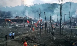 Vụ nổ khiến nhiều tòa nhà gần đó bị hư hại hoặc đổ sập hoàn toàn. Ảnh: CGTN