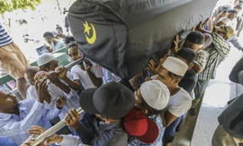 Tang lễ ông Khin Maung Latt ngày 7/3. Ảnh: EPA-EFE