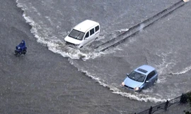 Trịnh Châu (tỉnh Hà Nam, Trung Quốc) ngập lụt vì mưa lớn ngày 20/7. Ảnh: AP