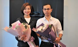 Nguyễn Thị Oanh và Lê Anh Tiến tại buổi giao lưu. Ảnh; Xuân Tùng