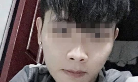 Nghi can T. bị công an bắt giữ trên đường lẩn trốn tại Sơn La. Ảnh: Pháp luật TP Hồ Chí Minh