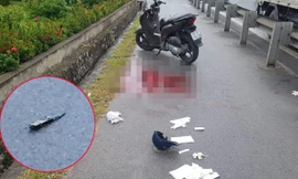 Hiện trường vụ án mạng và con dao bấm nghi can vứt lại trên đường