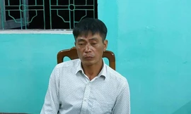 Đối tượng Lam Văn Đồng tại cơ quan công an