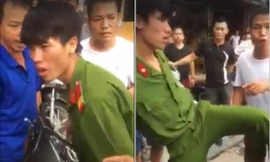 Chiến sĩ Tuấn có biểu hiện say rượu. Ảnh cắt từ clip.