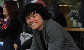 Ngô Hồng Quang trên đường phố Hà Nội. Ảnh: N.M.Hà.