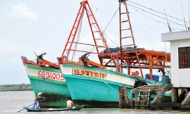 Những con tàu bị “hải tặc” tấn công trở về tại Đồn Biên phòng Tây Yên chiều 14/9.