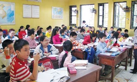 Học sinh lớp 5 trường Nguyễn Siêu sẽ phải làm bài test IQ, EQ để vào lớp 6. Ảnh: Hồng Vĩnh.