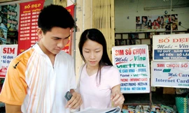 Có khoảng 120 triệu thuê bao sẽ phải gửi lại ảnh chân dung cho doanh nghiệp viễn thông. Ảnh: Hồng Vĩnh.