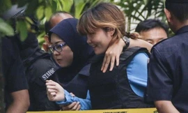 Đoàn Thị Hương sau phiên tòa lần 2 vào ngày 14/4. Ảnh: Getty Images.