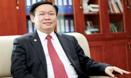 Ủy viên T.Ư Ðảng, Trưởng ban kinh tế T.Ư Vương Ðình Huệ.