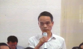 Đại diện NHNN trả lời HĐXX.