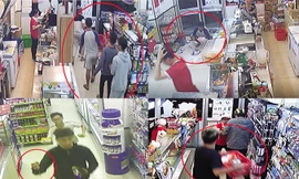 Các đối tượng giả khách hàng xông vào cửa hàng tiện ích 24 giờ cướp tài sản. Ảnh cắt từ clip.