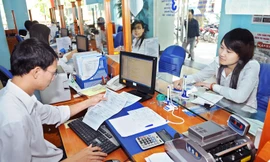 Kiểm soát thu nhập qua thuế