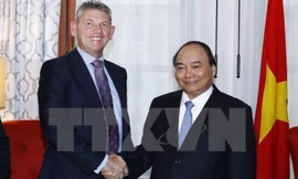 Sáng 30/5 (giờ địa phương, tức tối 30/5 giờ Hà Nội), tại thành phố New York, Thủ tướng Nguyễn Xuân Phúc tiếp ông Liam Mallon - Chủ tịch Công ty Phát triển Exxon Mobile. Ảnh: TTXVN.