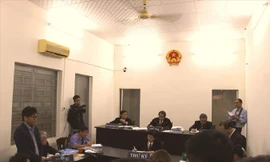 Hôm nay phiên tòa kiện đòi bồi thường giữa Taxi Vinasun và Grab Taxi tiếp tục xét xử. Ảnh: Tân Châu.