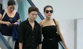 Lâm Chi Khanh lưng trần sánh đôi bạn trai ở sân bay