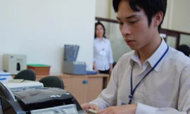 Dự trữ ngoại hối 73 tỷ USD cũng mới chỉ tương đương với khoảng hơn 14 tuần nhập khẩu. Ảnh: Nhật Minh 