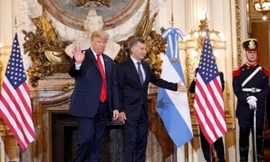 Tổng thống Mỹ Donald Trump (trái) và Tổng thống Argentina Mauricio Macri. Ảnh: Reuters 