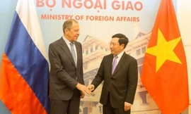 Phó Thủ tướng Phạm Bình Minh và Ngoại trưởng Nga Sergei Lavrov tại cuộc gặp ngày 23/3. (Ảnh: VTC)